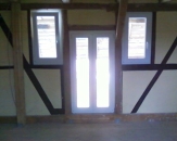 Fenster und Fenstertür im Fachwerk
